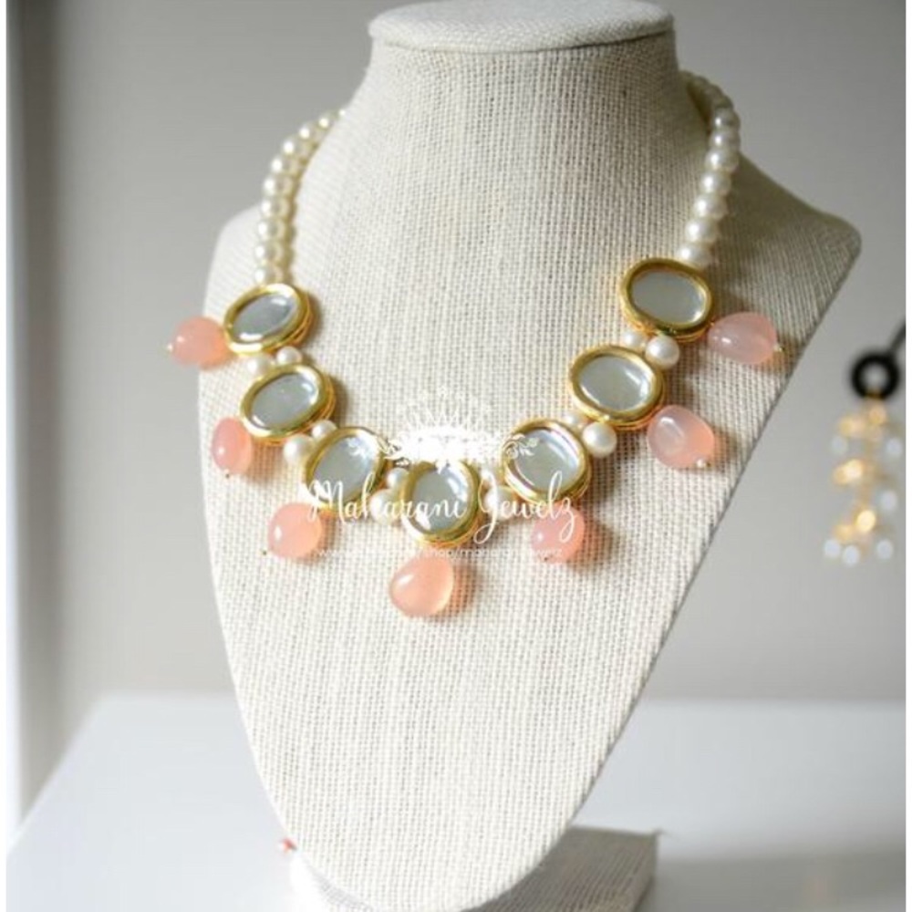 Kundan and pearl necklace and earrings set